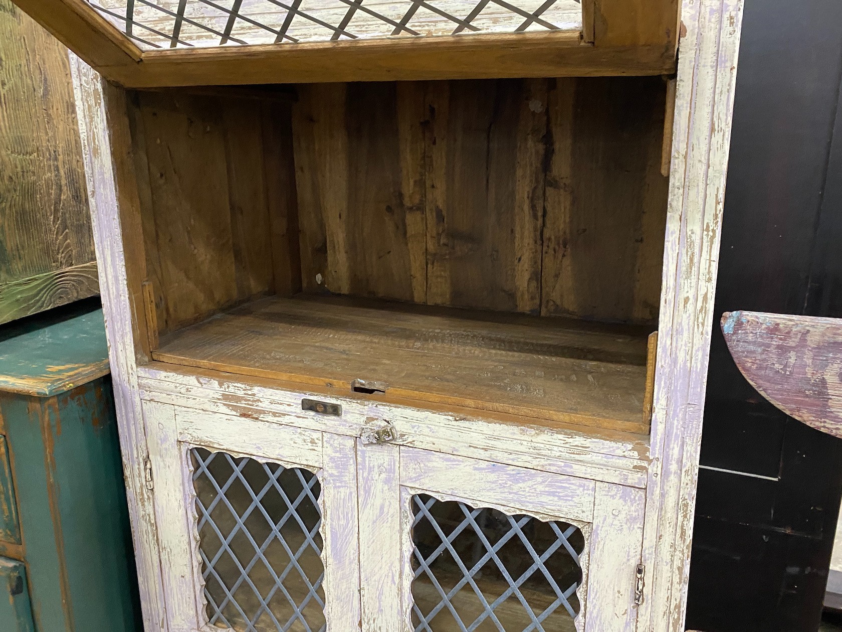 A provincial painted wood side cabinet with leaded glazed doors, width 64cm, depth 36cm, height 127cm